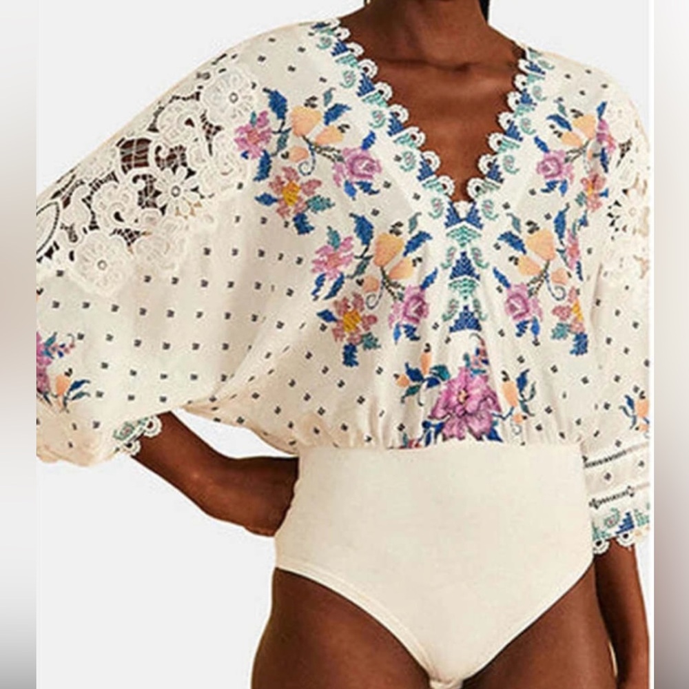 Farm Rio bodysuit, size large. Never worn.